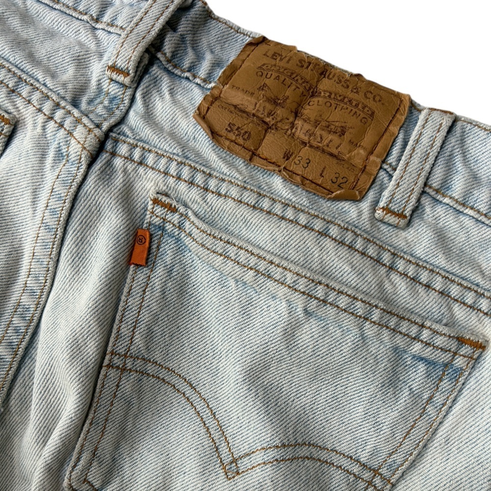 Vintage Orange Tab Levi’s 550 Light Wash Relaxed Baggy Jeans Made in USA, 33